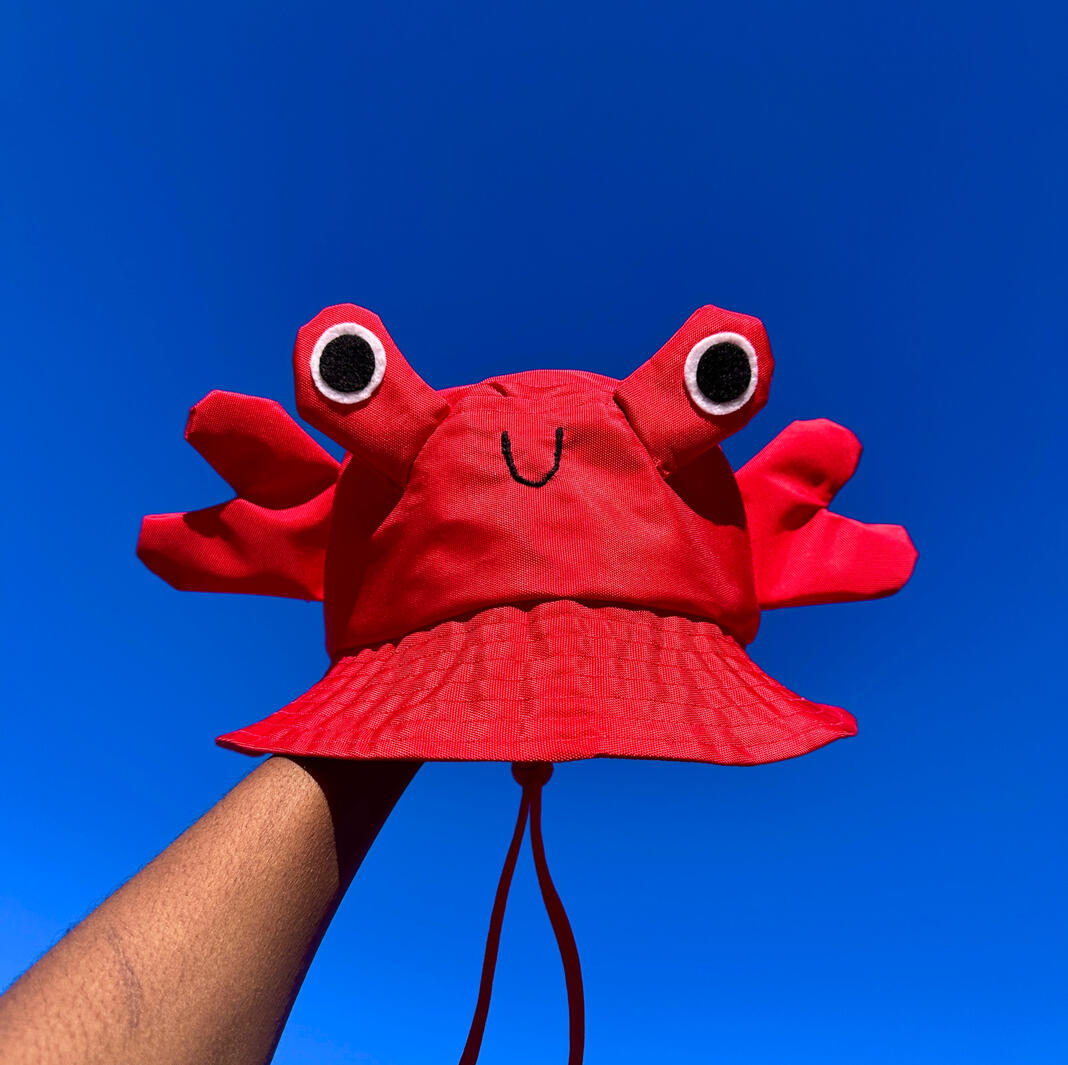 Sailor Shrimpp’s custom handmade, crab bucket hats.